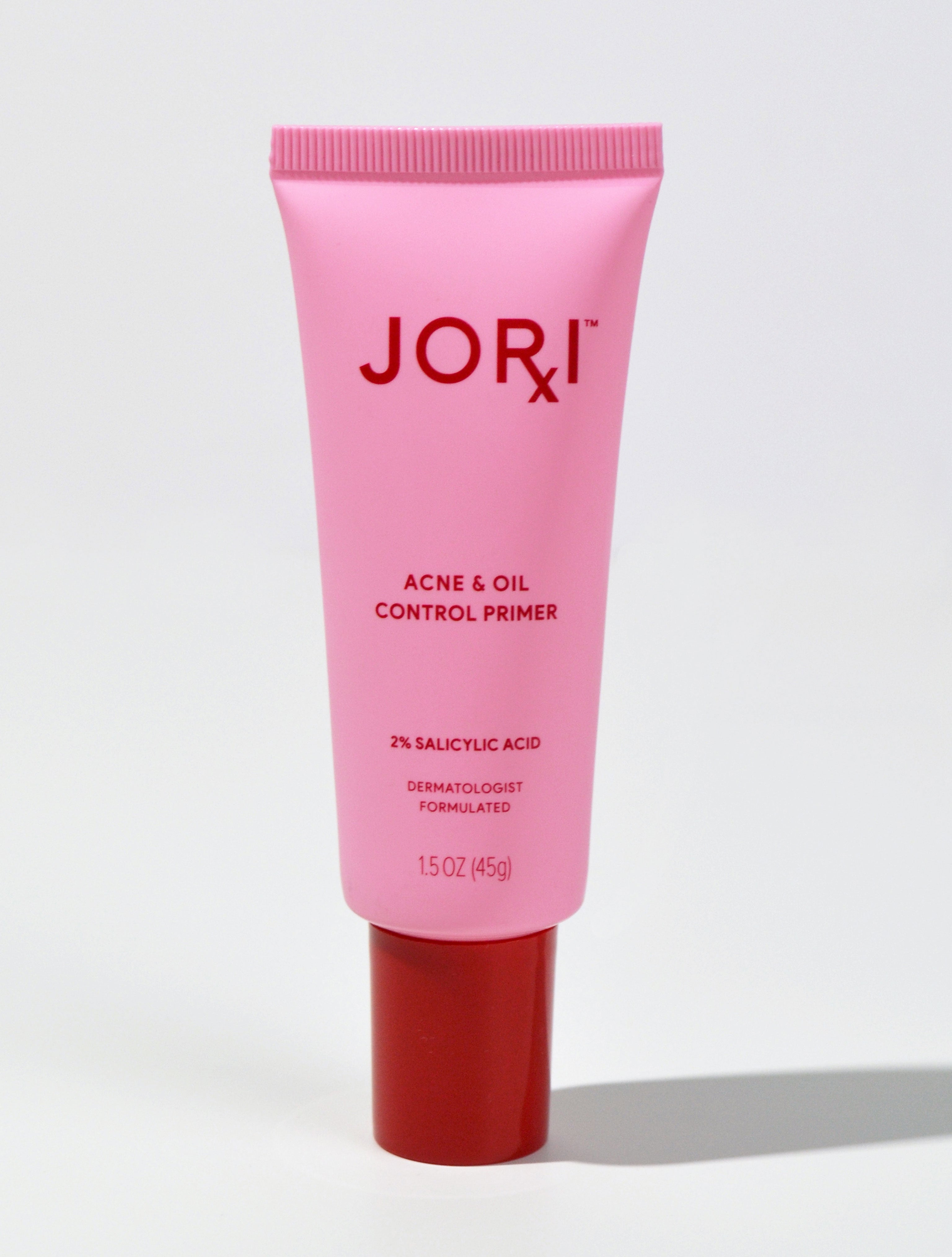 Pink and red bottle of Jori Primer